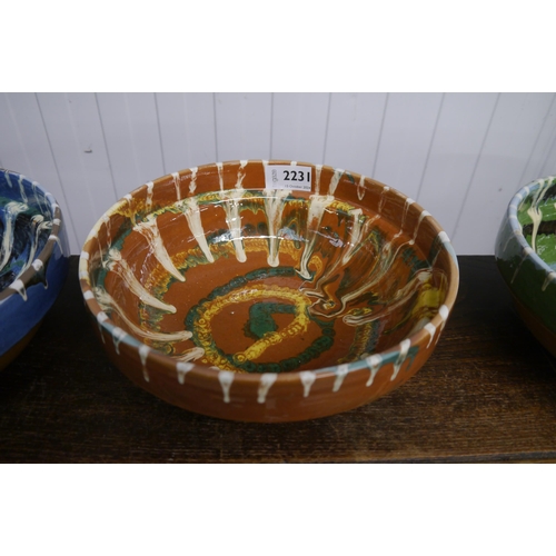 2231 - A orange glazed bowl