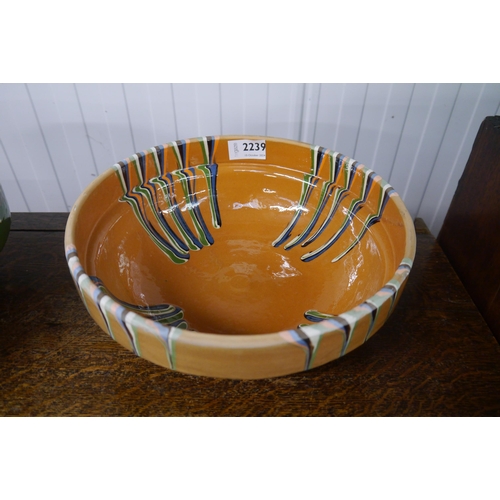 2239 - An orange glazed bowl