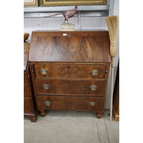 2242 - A George III flame mahogany bureau (a/f)