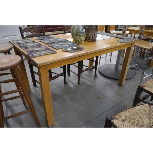 2265 - A light oak dining table