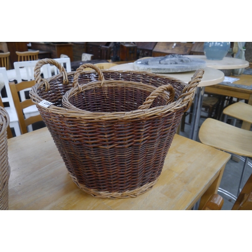 2268 - Two twin handled graduating willow woven baskets