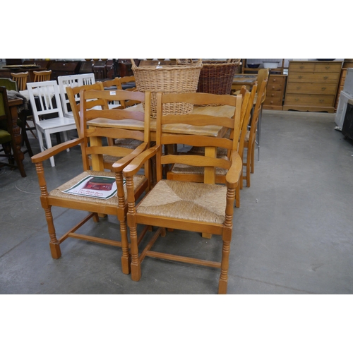 2270 - A set of eight beech dining chairs with seagrass seats (6+2)