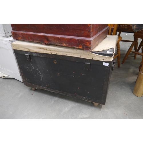 2283 - A black painted metal bound trunk