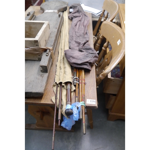 2295 - Two vintage cane fishing rods