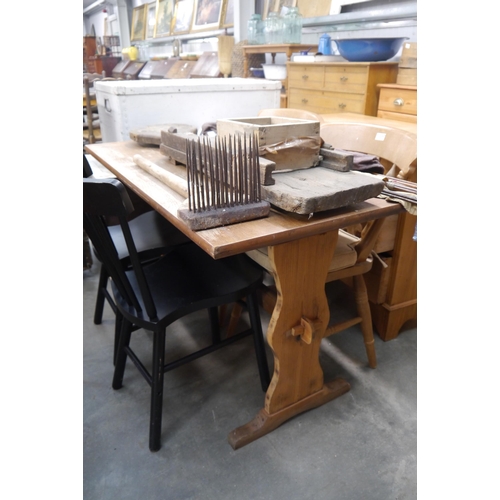 2296 - An oak topped trestle table