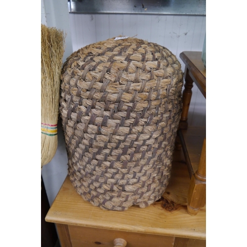 2299 - A rustic woven bee-hive