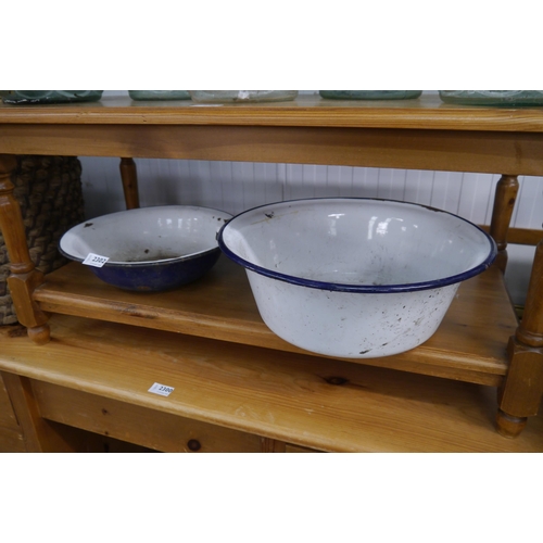 2302 - Two blue and white enamel bowls