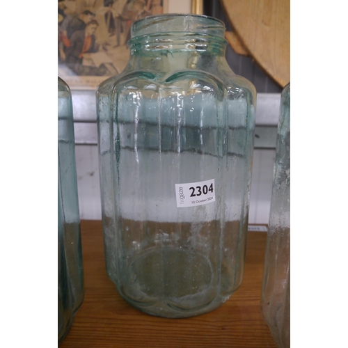 2304 - A hand thrown glass vase