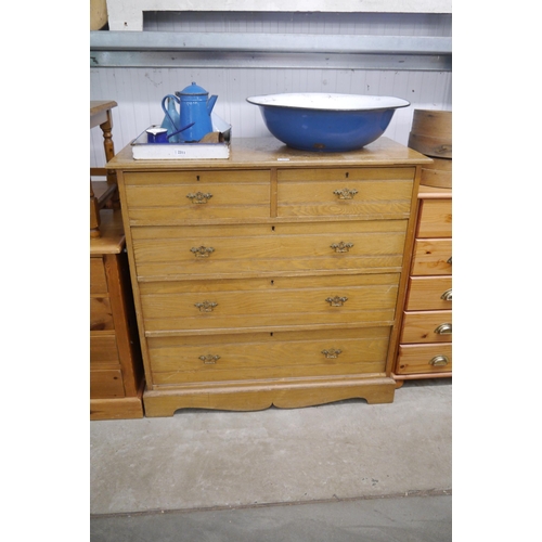 2313 - An Edwardian ash two over three chest of drawers