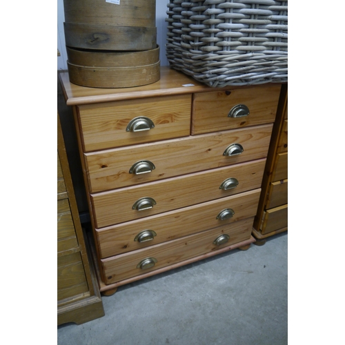 2314 - A modern pine set of drawers, cup handles