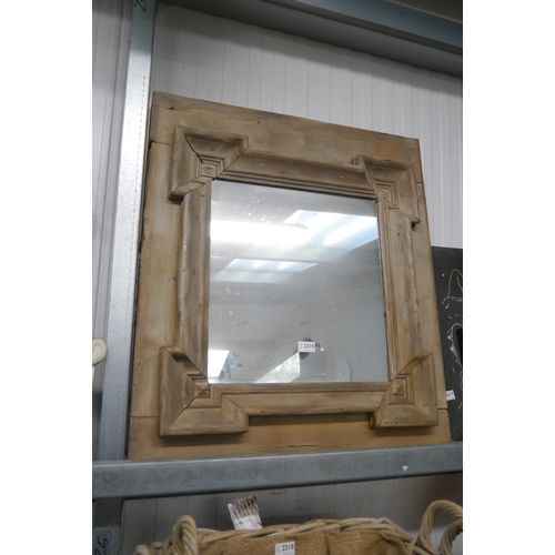 2316 - A Georgian pine framed mirror