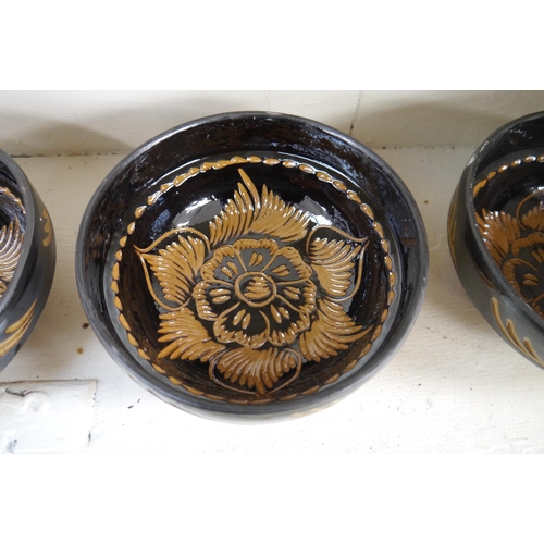 2343 - Twelve hand thrown pottery bowls