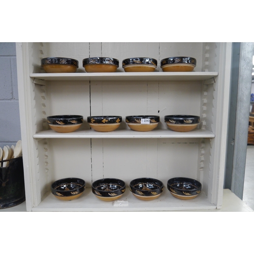 2343 - Twelve hand thrown pottery bowls