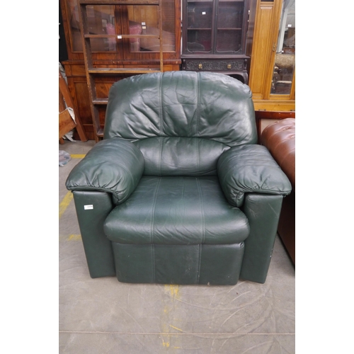 2358 - A green leather G-Plan arm chair