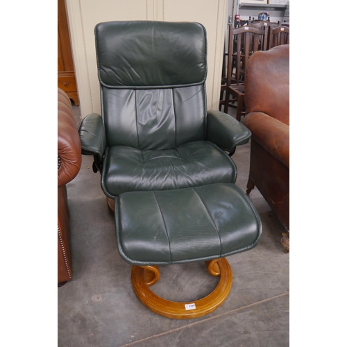 2360 - A Stressless green leather chair and stool