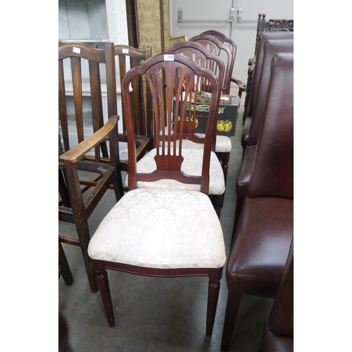 2365 - Four mahogany dining chairs, one carver