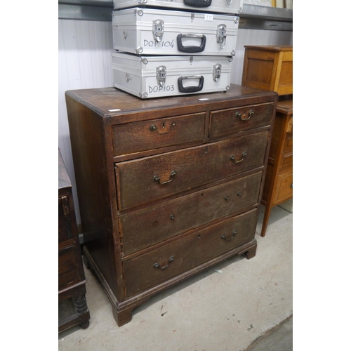 2372 - A George III oak country chest of two short over three long drawers, some handles missing, on bracke... 