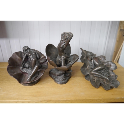 2379 - Three nude resin bronze ladies in leaf figures