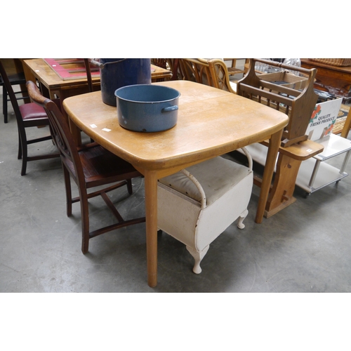 2439 - A mid century Danish oak dining table