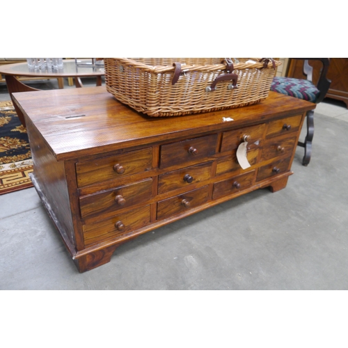 2454 - A hardwood coffee table chest of twelve drawers