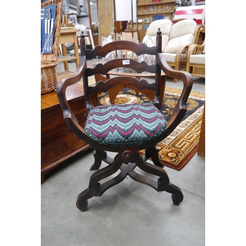 2456 - A Victorian walnut ladder back chair