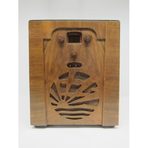 7298 - A Pye model G valve radio in Art Deco rising sun walnut case with Bakelite knobs, c.1932, 50cm tall.... 