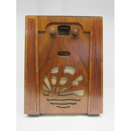 7309 - A Pye model S valve radio in Art Deco rising sun walnut case with Bakelite knobs, c.1932, 54cm tall.... 