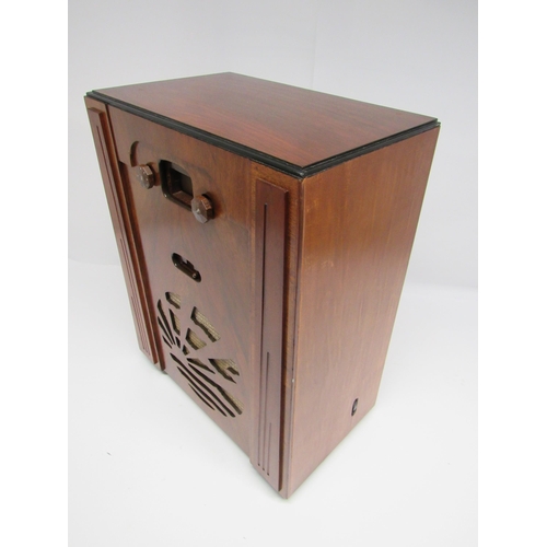 7309 - A Pye model S valve radio in Art Deco rising sun walnut case with Bakelite knobs, c.1932, 54cm tall.... 