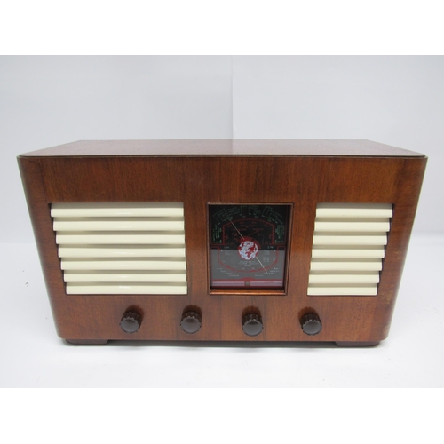 7340 - A vintage Pullman wooden cased valve radio with brown Bakelite knobs and cream Bakelite speaker fret... 