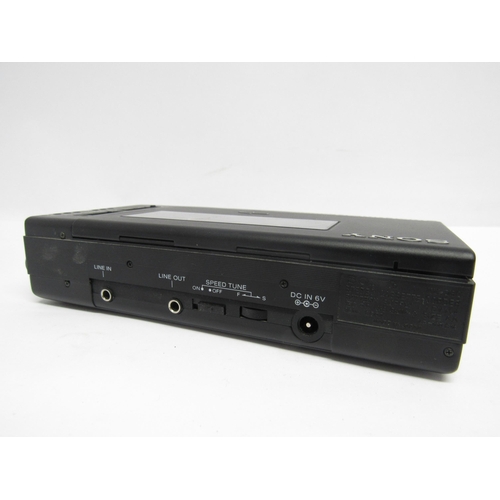 7476 - A boxed Sony WM-D64 Professional Stereo Cassette Recorder, lacking battery cover, with accompanying ... 