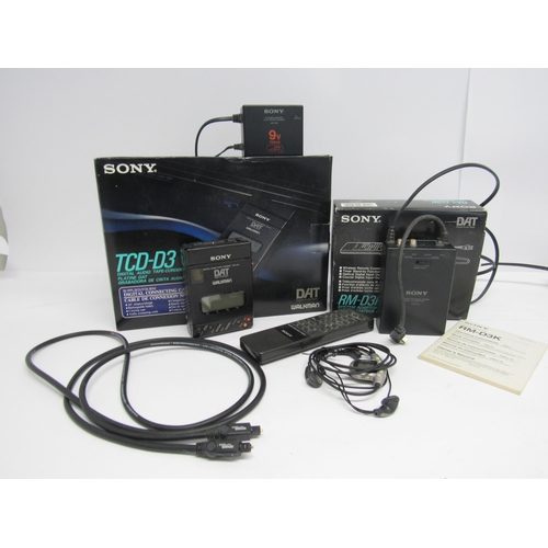 7475 - A Sony TCD-D3 DAT Digital Audio Tape-Corder with AC adaptor/ charger, and a Sony RM-D3K System Adapt... 