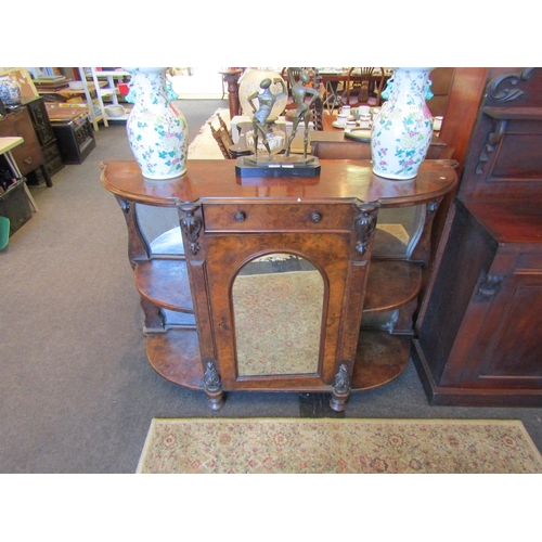 1116 - A Victorian flame walnut mirror-back credenza, twin shelved corner alcoves, loose foot, top not atta... 