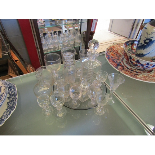 1483 - A collection of assorted glassware including early drinking glasses and decanters