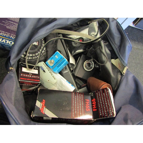 1493 - A Sony handycam model CCD-FX 300E and a bag of camera accessories and binoculars etc.