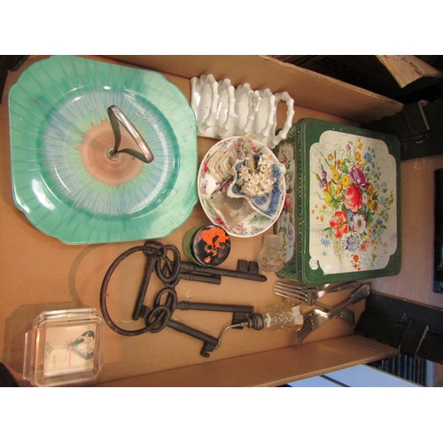 1504 - Three boxes of mixed collectable tins, paintings, shelley cake stand, shell case etc.