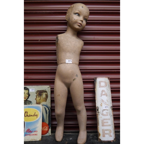 2074 - A child mannequin with glass eyes, armless