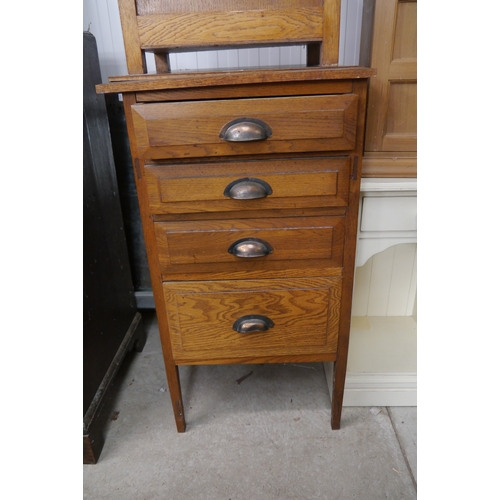 2374 - An Edwardian oak chest of four drawers