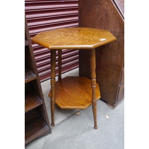 2468 - A 1930's honey oak two tier lamp table