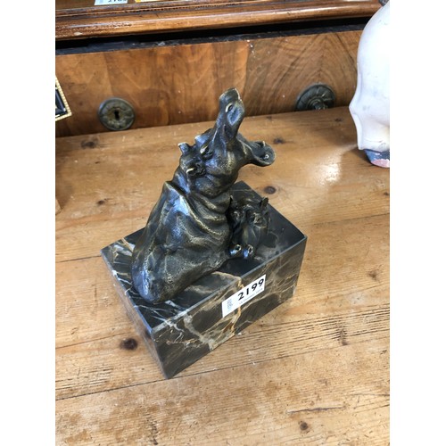 2199 - A bronze of two hippos in water, on marble plinth