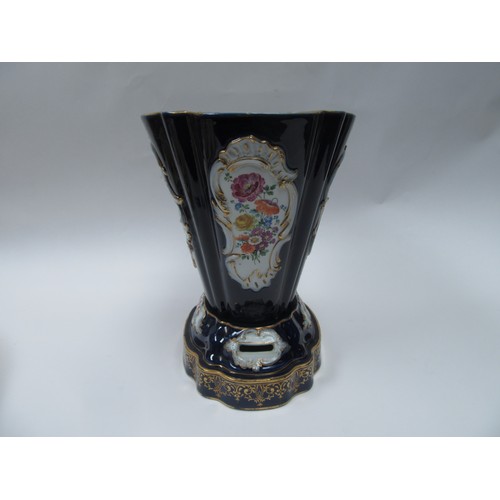 4077 - A hard paste two section jardiniere, cobalt blue ground, cartouche depicting lovers and still-life o... 