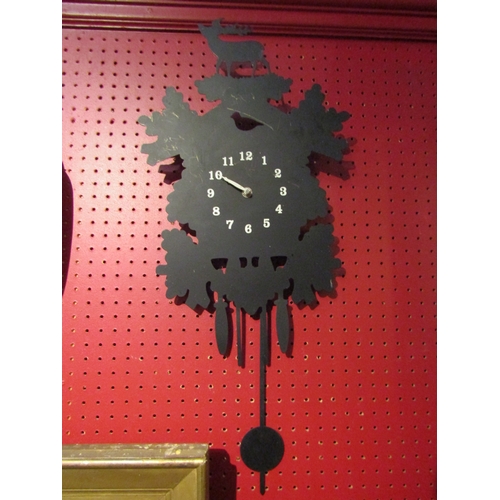 4080 - A silhouette of a cuckoo clock wall clock