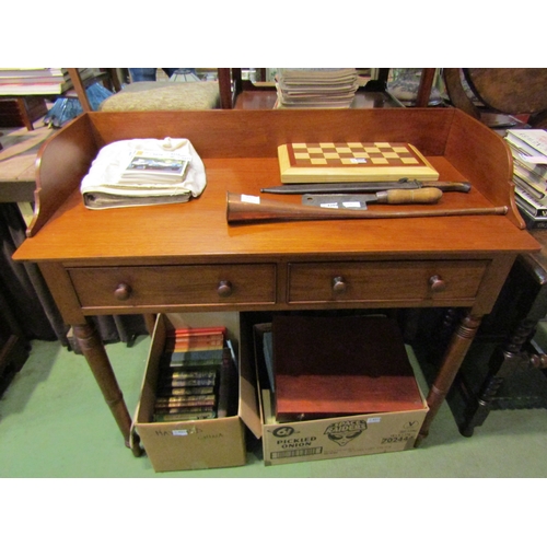 4151 - A Victorian mahogany washstand, the three quarter raised back over two frieze drawers on ring turned... 