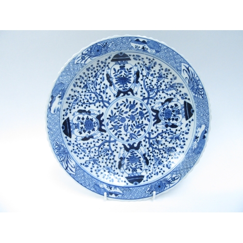 4424 - A pair of Chinese blue and white plates with Yu mark to base in double circle mark, possibly Kangxi ... 