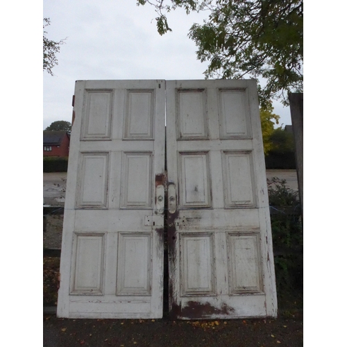 8003 - A pair of pine panelled doors, 260cm x 107cm each door