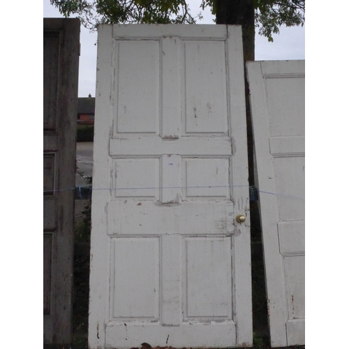 8005 - A pine panelled door, 241cm x 114cm