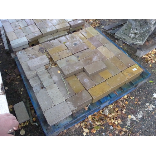 8027 - A pallet of approx 100 grey floor bricks