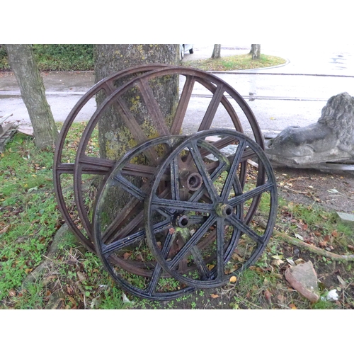 8031 - A set of four iron shepherd hut wheels; one pair 30.5