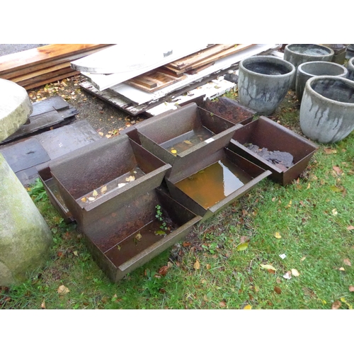 8047 - Eight cast iron feeders, some a/f