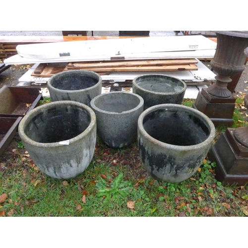 8048 - A set of four composition garden pots, 13