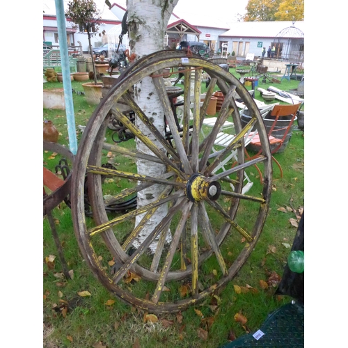 8066 - A pair of wood and iron cart wheels with 'Morris' hibs, 129cm diameter